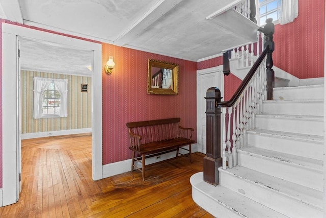 staircase featuring hardwood / wood-style flooring