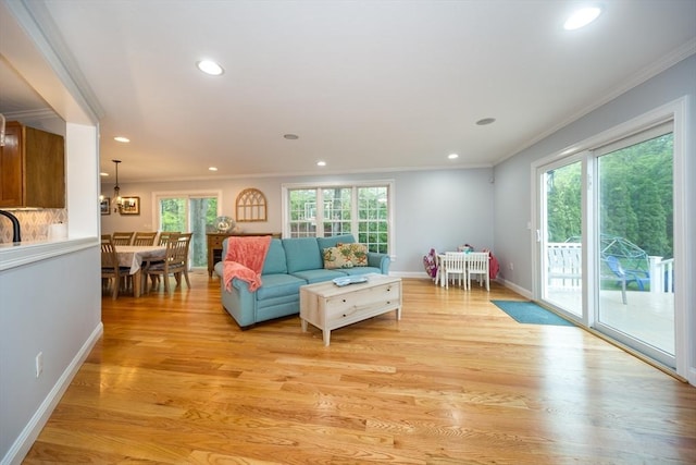 5 Lake Boon Dr, Hudson, MA 01749 - living area featuring ornamental molding, recessed lighting, light wood-type flooring, and baseboards