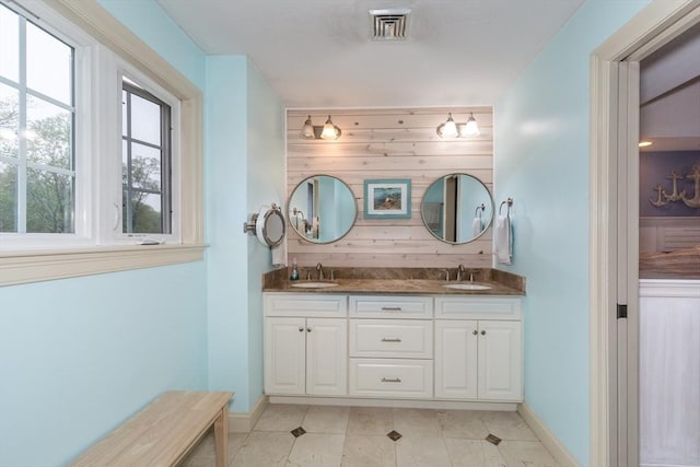 5 Lake Boon Dr, Hudson, MA 01749 - bathroom featuring double vanity, baseboards, and tile patterned floors
