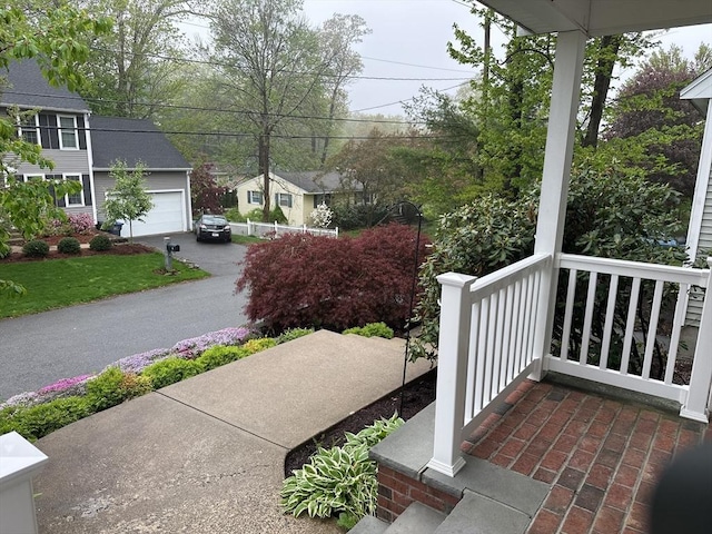 5 Lake Boon Dr, Hudson, MA 01749 - view of patio with covered porch and driveway