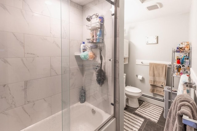 bathroom featuring bath / shower combo with glass door, baseboard heating, and toilet