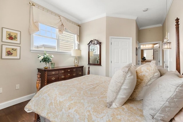 bedroom with dark wood-type flooring, crown molding, and baseboards