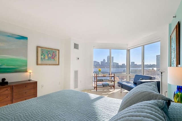 75-83 Cambridge Pkwy Unit W1009, Cambridge, MA 02142 - bedroom with a skyline view