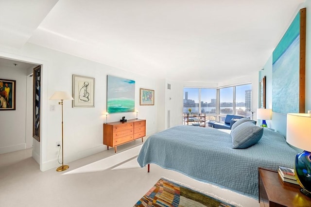 75-83 Cambridge Pkwy Unit W1009, Cambridge, MA 02142 - bedroom featuring carpet flooring and baseboards