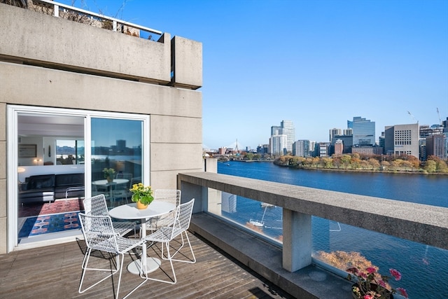 balcony featuring a water view