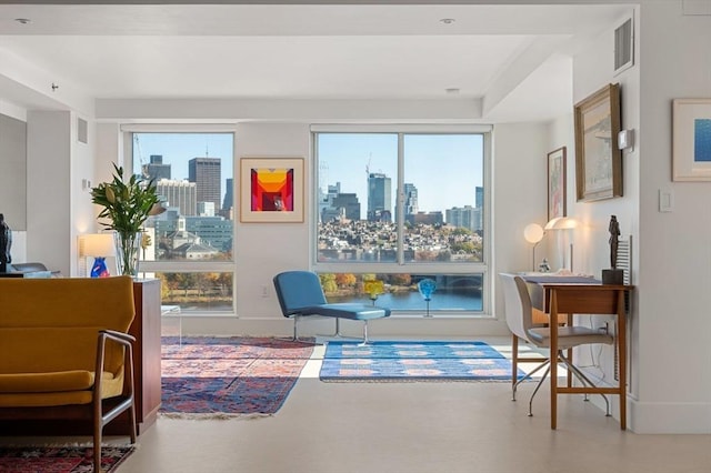 75-83 Cambridge Pkwy Unit W1009, Cambridge, MA 02142 - living area featuring an office area and a skyline view