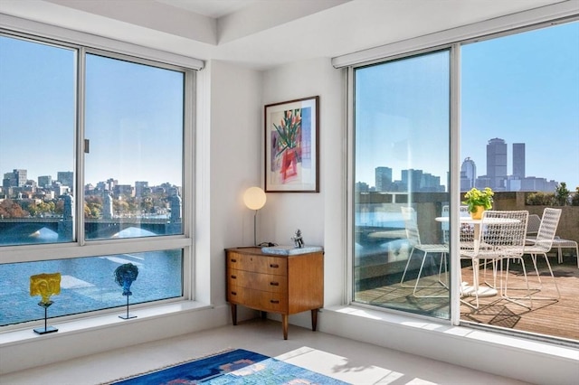 75-83 Cambridge Pkwy Unit W1009, Cambridge, MA 02142 - sitting room featuring a skyline view