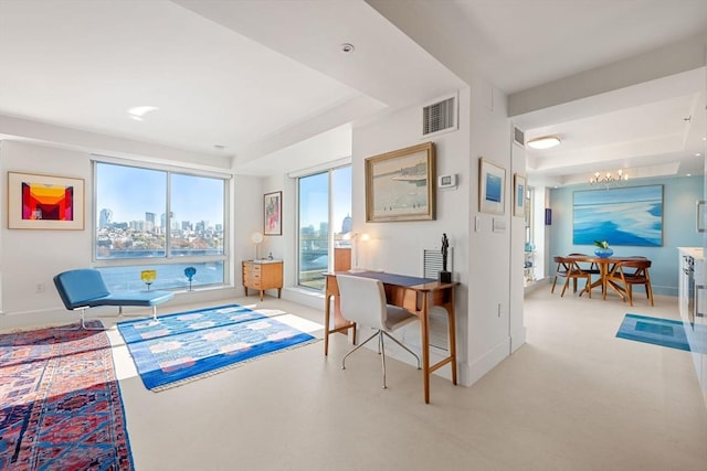 75-83 Cambridge Pkwy Unit W1009, Cambridge, MA 02142 - home office featuring a chandelier, a raised ceiling, baseboards, and a skyline view