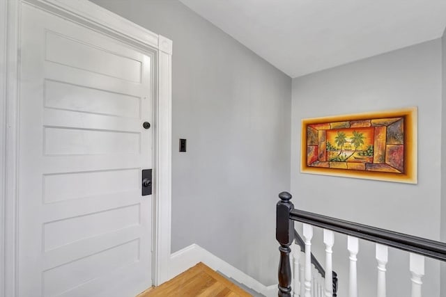 6-8 Carlton, Lynn, MA 01902 - corridor with an upstairs landing, baseboards, and light wood finished floors