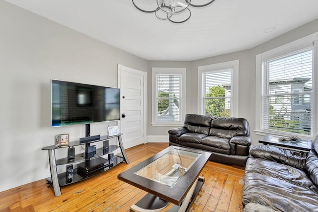 6-8 Carlton, Lynn, MA 01902 - living room featuring a chandelier, baseboards, and hardwood / wood-style flooring