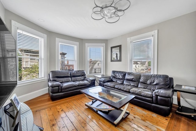 6-8 Carlton, Lynn, MA 01902 - living room with a chandelier, baseboards, and hardwood / wood-style floors