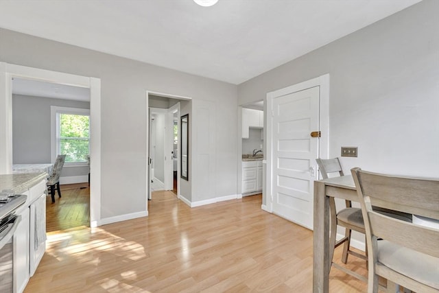 6-8 Carlton, Lynn, MA 01902 - office area with light wood-type flooring and baseboards