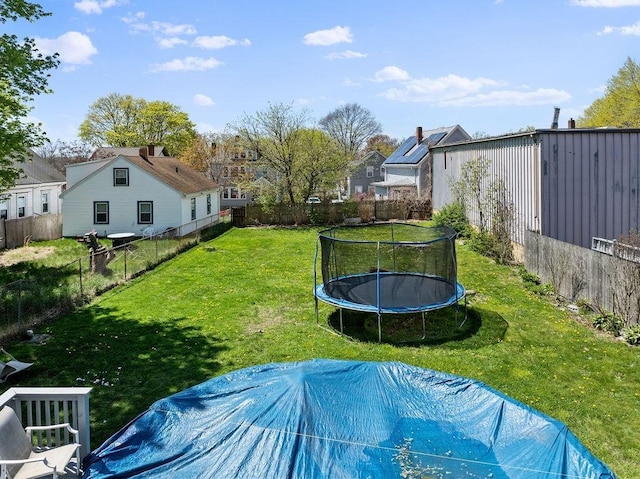 77 Shawmut Ave, New Bedford, MA 02740 - view of yard featuring a fenced backyard and a trampoline