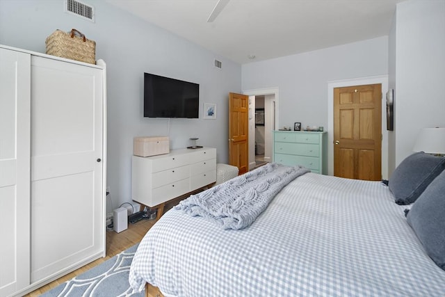 414 Sumner St Unit 1, Boston, MA 02128 - bedroom with wood finished floors, a ceiling fan, and a closet