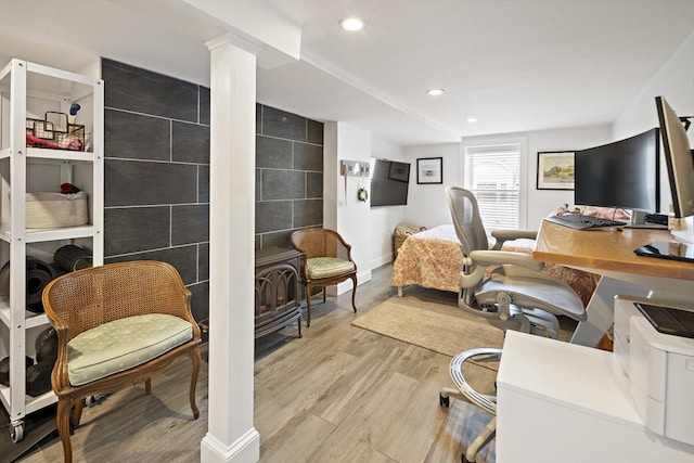 414 Sumner St Unit 1, Boston, MA 02128 - office area with light wood-style flooring, recessed lighting, a wood stove, and baseboards
