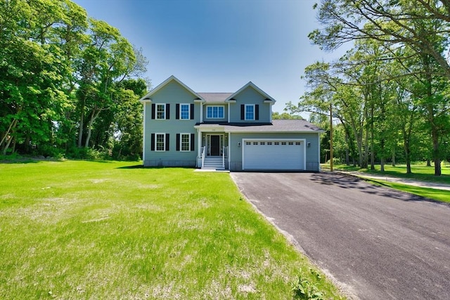 526 Old Warren Rd, Swansea, MA 02777 - view of front of house featuring driveway, a front yard, and an attached garage