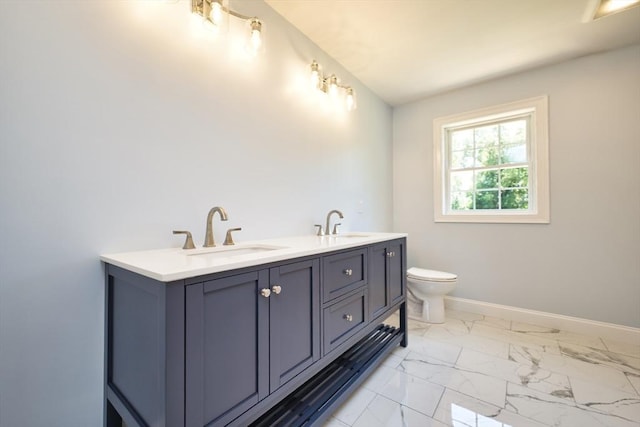 526 Old Warren Rd, Swansea, MA 02777 - bathroom featuring marble look tiles and double vanity