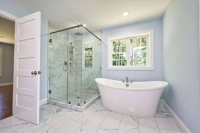 526 Old Warren Rd, Swansea, MA 02777 - full bath with a freestanding tub, marble look tiles, a marble finish shower, and recessed lighting