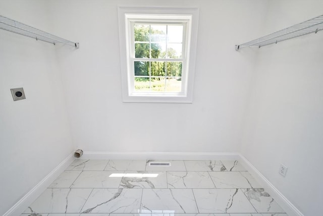 526 Old Warren Rd, Swansea, MA 02777 - laundry area featuring electric dryer hookup and marble finish flooring