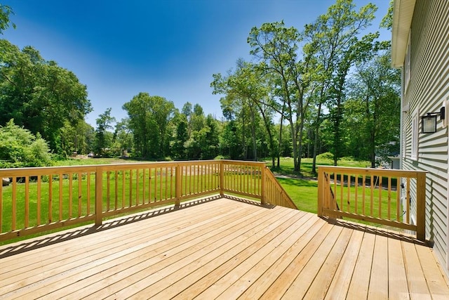 526 Old Warren Rd, Swansea, MA 02777 - deck with a lawn and view of wooded area