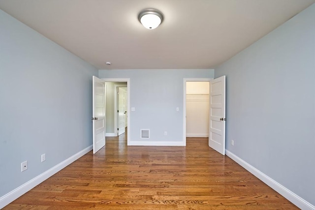 526 Old Warren Rd, Swansea, MA 02777 - unfurnished bedroom with wood finished floors and baseboards