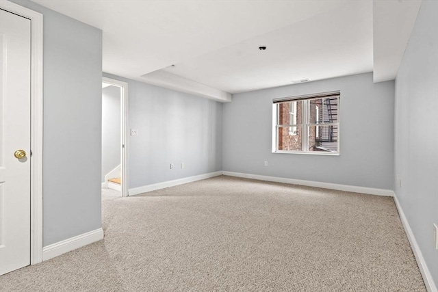 view of carpeted spare room