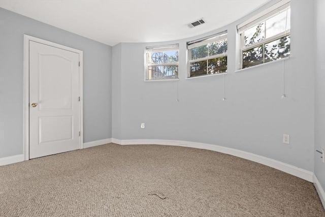 view of carpeted spare room