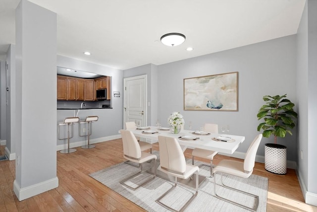 dining room featuring light hardwood / wood-style floors