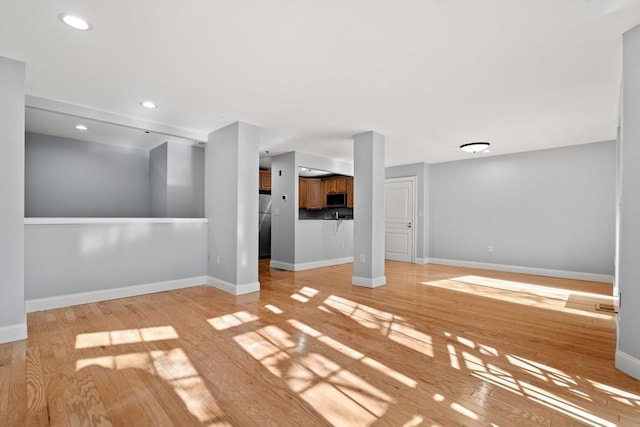 interior space with light hardwood / wood-style flooring