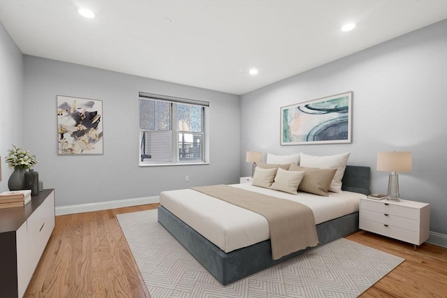 bedroom with light hardwood / wood-style floors