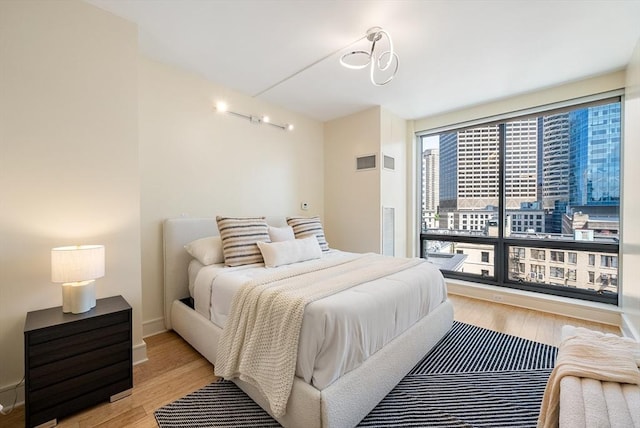 45 Province St Unit 1103, Boston, MA 02108 - bedroom featuring wood finished floors