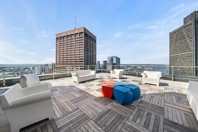 45 Province St Unit 1103, Boston, MA 02108 - wooden terrace with an outdoor hangout area and a view of city