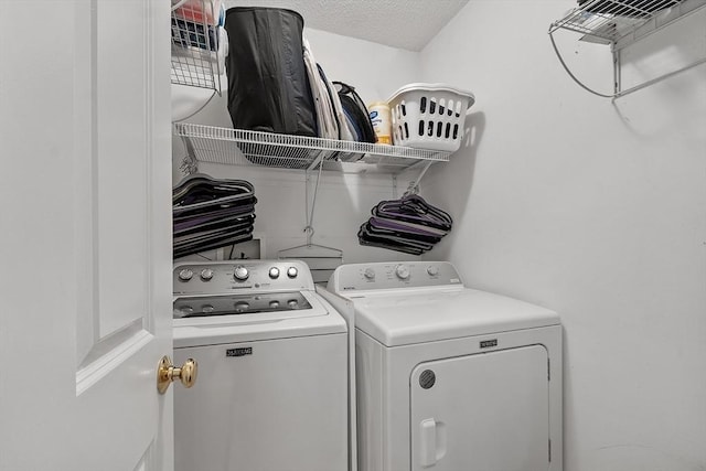 washroom featuring separate washer and dryer
