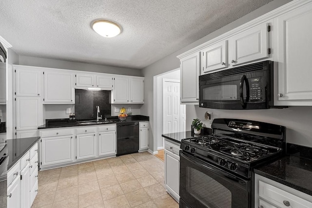 kitchen with black appliances, a sink, white cabinets, dark countertops, and a textured ceiling