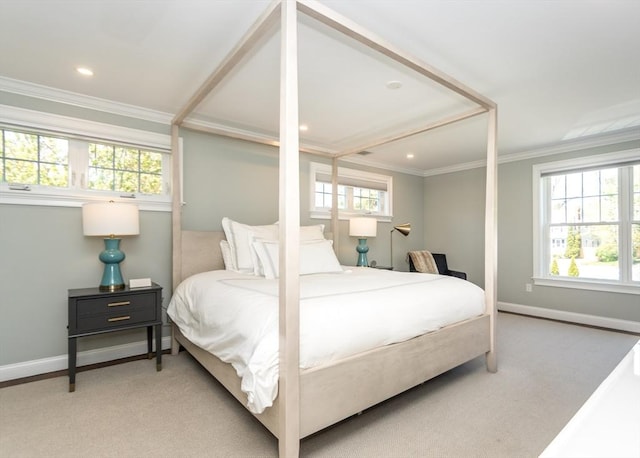 carpeted bedroom with baseboards, crown molding, and recessed lighting