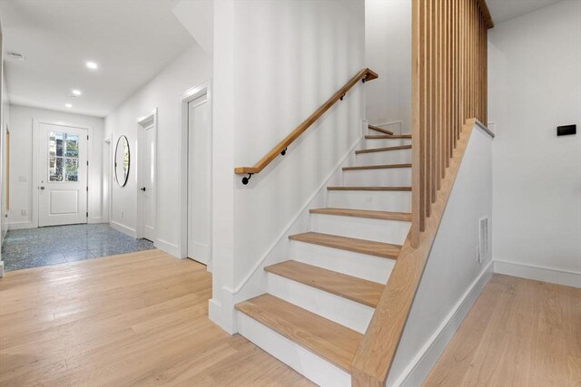 44 Robeson St Unit 44B, Boston, MA 02130 - foyer featuring wood finished floors, recessed lighting, baseboards, and stairs