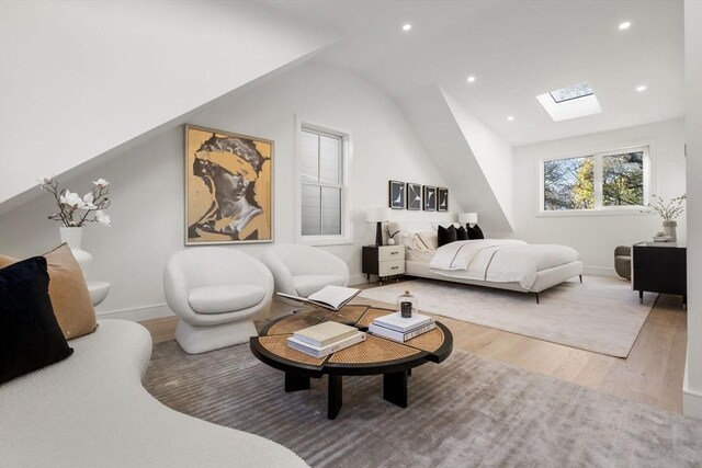 44 Robeson St Unit 44B, Boston, MA 02130 - bedroom featuring a skylight, light wood finished floors, vaulted ceiling, baseboards, and recessed lighting