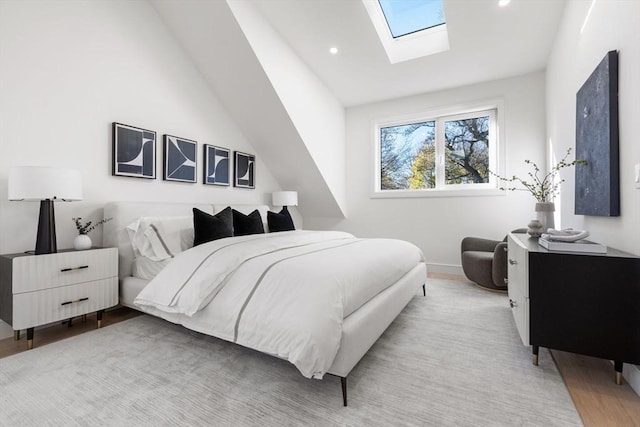 44 Robeson St Unit 44B, Boston, MA 02130 - bedroom featuring a skylight, vaulted ceiling, baseboards, recessed lighting, and wood finished floors