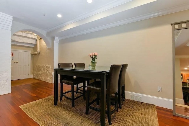 19 Bay State Rd Unit 1, Boston, MA 02215 - dining area with crown molding, wood finished floors, arched walkways, recessed lighting, and baseboards