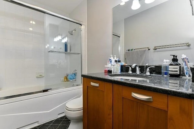 19 Bay State Rd Unit 1, Boston, MA 02215 - bathroom with vanity, toilet, tile patterned floors, and enclosed tub / shower combo
