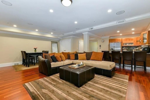 19 Bay State Rd Unit 1, Boston, MA 02215 - living room featuring ornamental molding, wood finished floors, baseboards, and recessed lighting