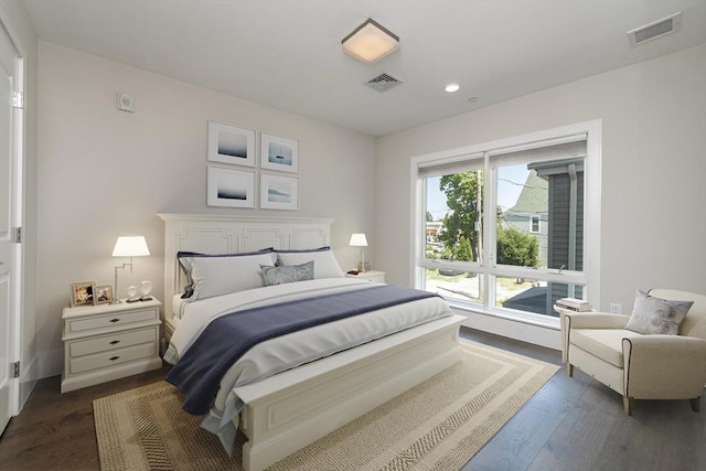 bedroom featuring dark hardwood / wood-style floors