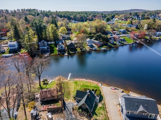 birds eye view of property featuring a water view and a residential view