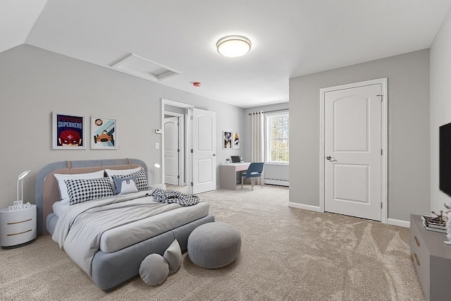 bedroom with lofted ceiling, light colored carpet, and a baseboard radiator