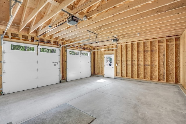 garage featuring a garage door opener