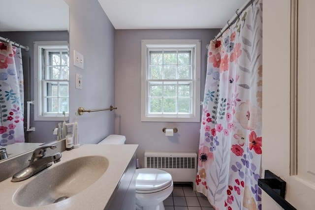 9 Brucewood, Acton, MA 01720 - full bathroom with tile patterned flooring, vanity, curtained shower, toilet, and radiator heating unit