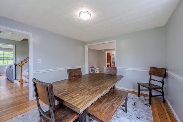9 Brucewood, Acton, MA 01720 - dining space featuring stairway, baseboards, and light wood finished floors