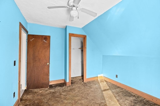 additional living space featuring lofted ceiling, carpet flooring, and ceiling fan