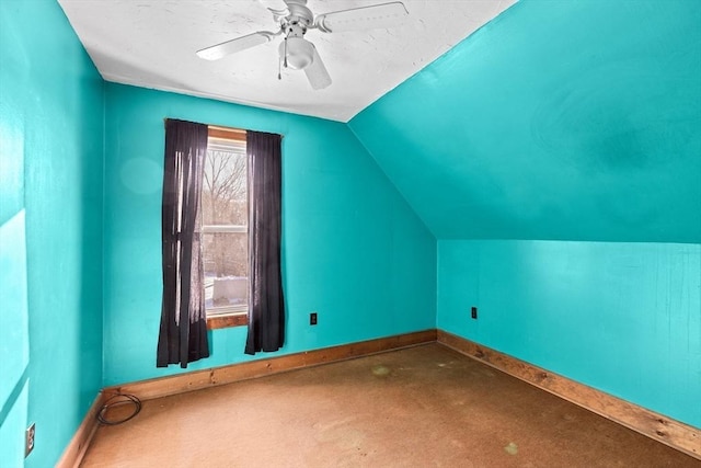 additional living space with ceiling fan and lofted ceiling