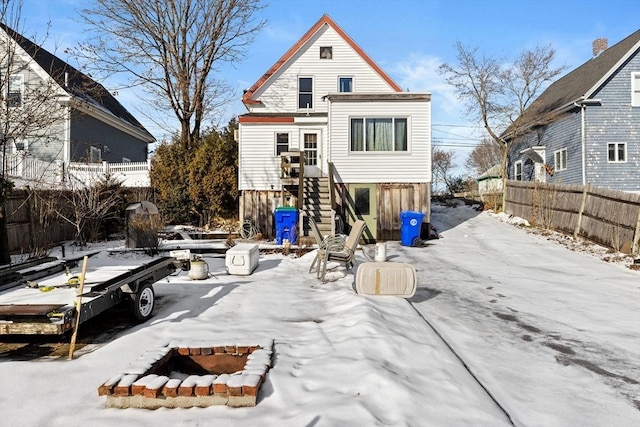 view of snow covered house